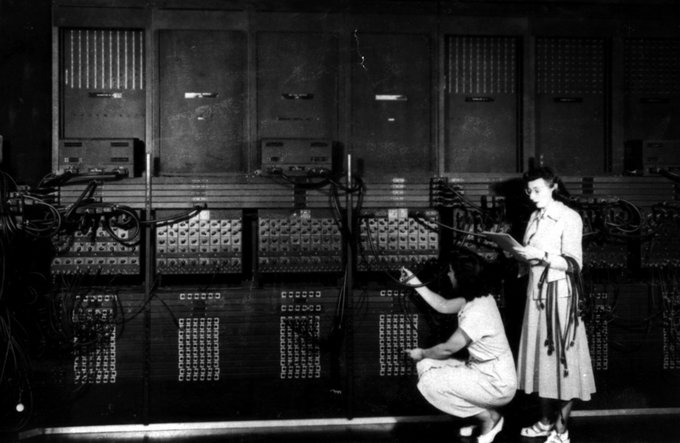Ester Gerston and Gloria Gordon Bolotsky reprogram ENIAC by hand.