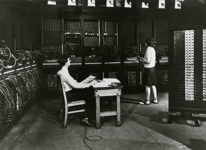 ENIAC at the Moore School, with operators working among the machinery.