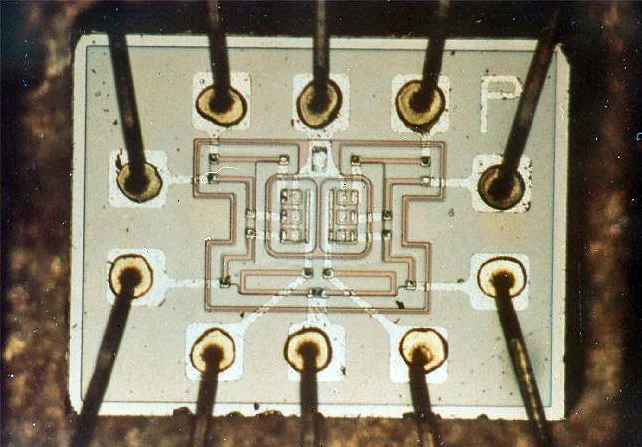 Magnified silicon die of an Apollo Guidance Computer NOR-gate integrated circuit.